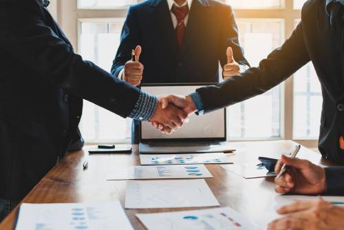 Negotiating a business deal. Concept of dispute resolution and mediation.